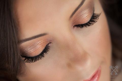Model closing eyes after makeup