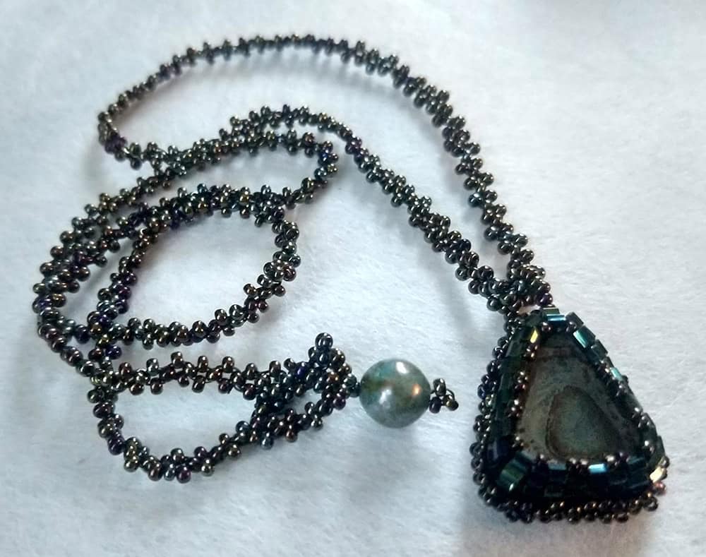 Ann Recotta "Bronze/Green Triangle Necklace" 18" chain with bead embroidery and bead weaving $115. SOLD