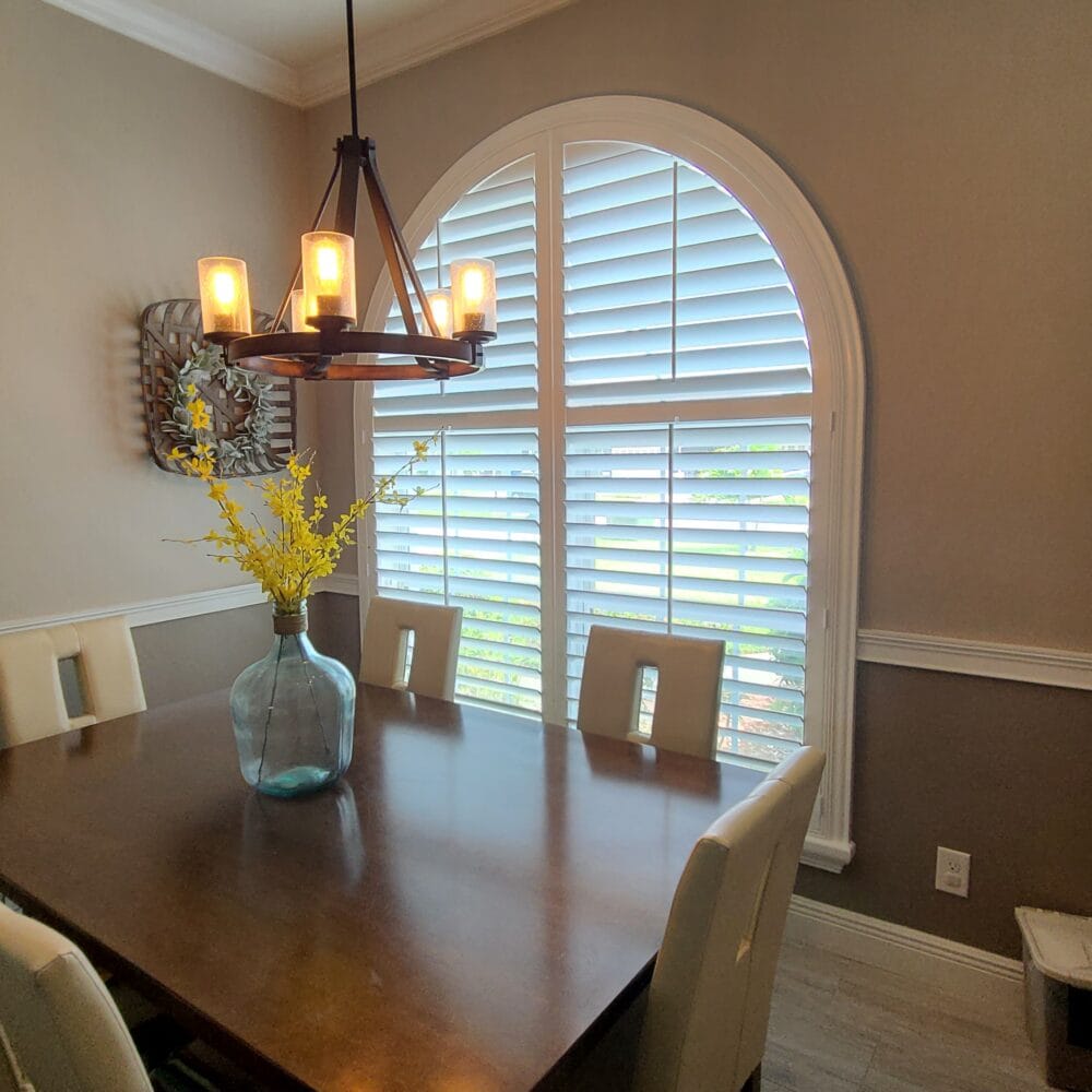 Arched Plantation Shutter in a Dining Room