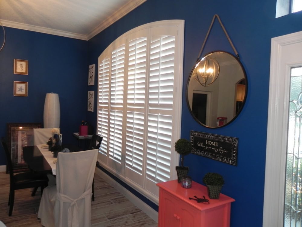 Custom Arched Norman Shutters