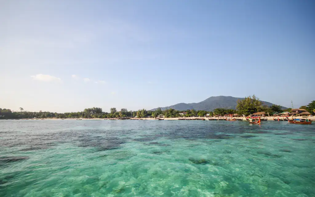 The turquoise waters and white sand beach of Koh Lipe, a stunning setting for a luxury beach resort or a DMC-planned group event.