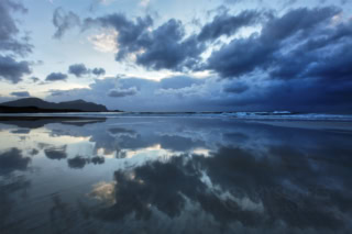 Clouds reflected on Rambergstranda - Norway