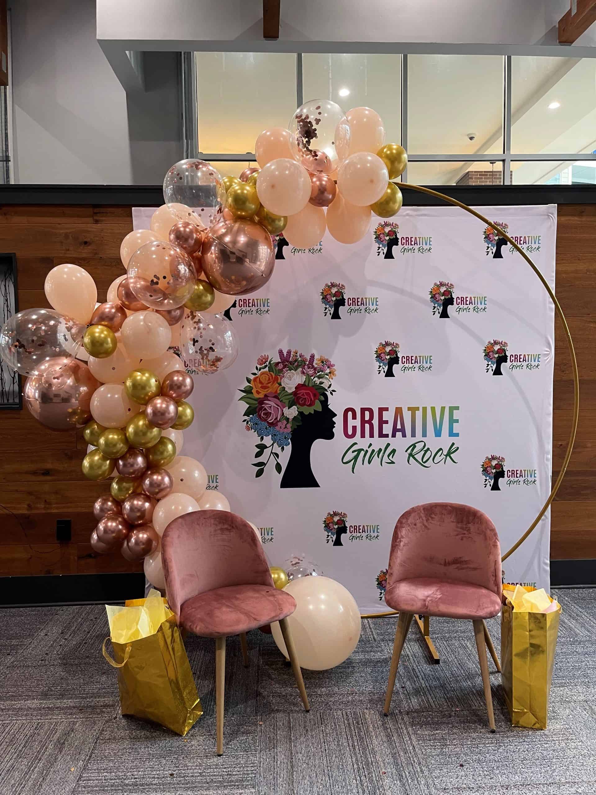 Step and repeat backdrop using a collapsible display for an event.