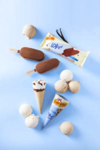 Ijsboerke food photography scoops of ice cream and ice cream cones on a blue background