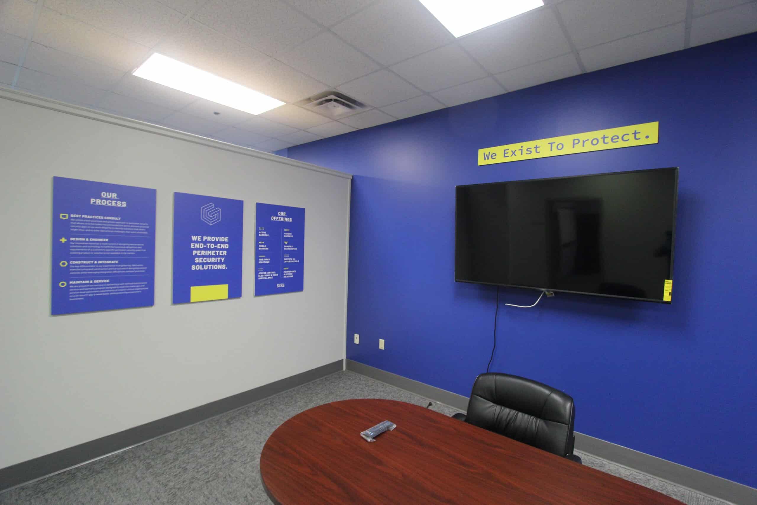 The office is enhanced by the presence of product and company posters displayed on the walls, contributing to a vibrant and engaging atmosphere.