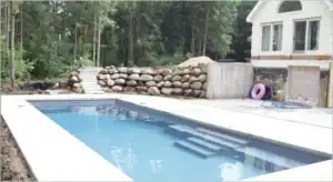 Outdoor Rectangular Pool with Stone Jacuzzi