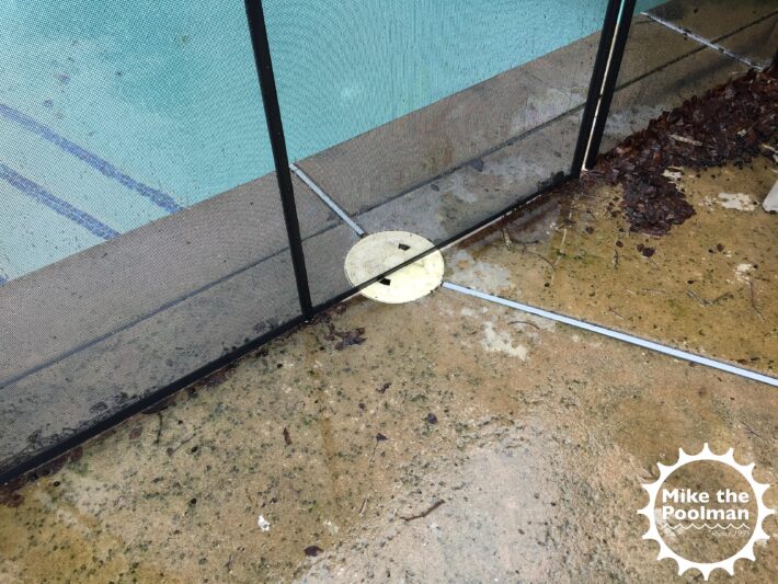 Safety fence over pool skimmer lid